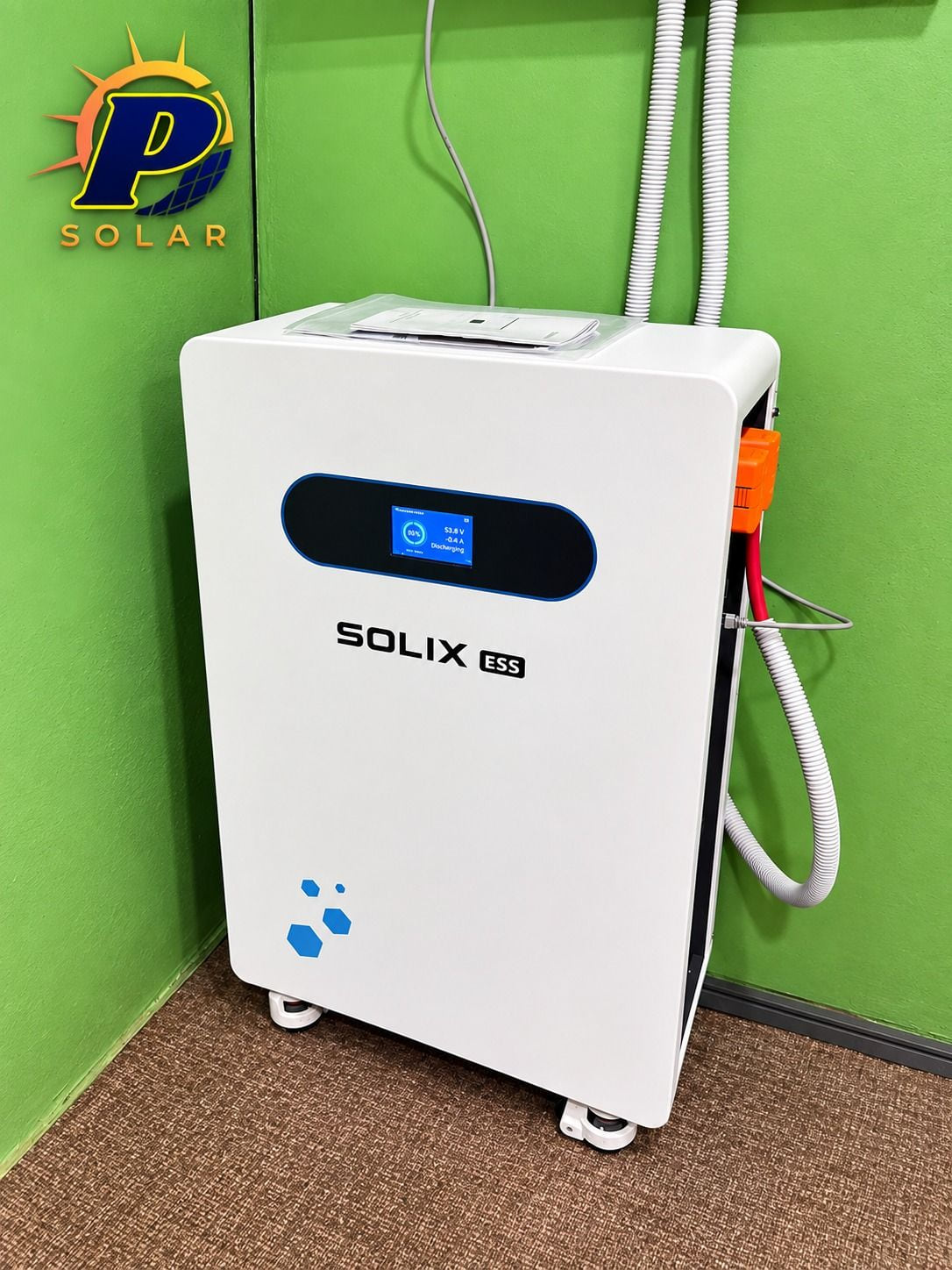 The floor-standing SOLIX ESS battery cabinet against the wall, cables dressed behind it.